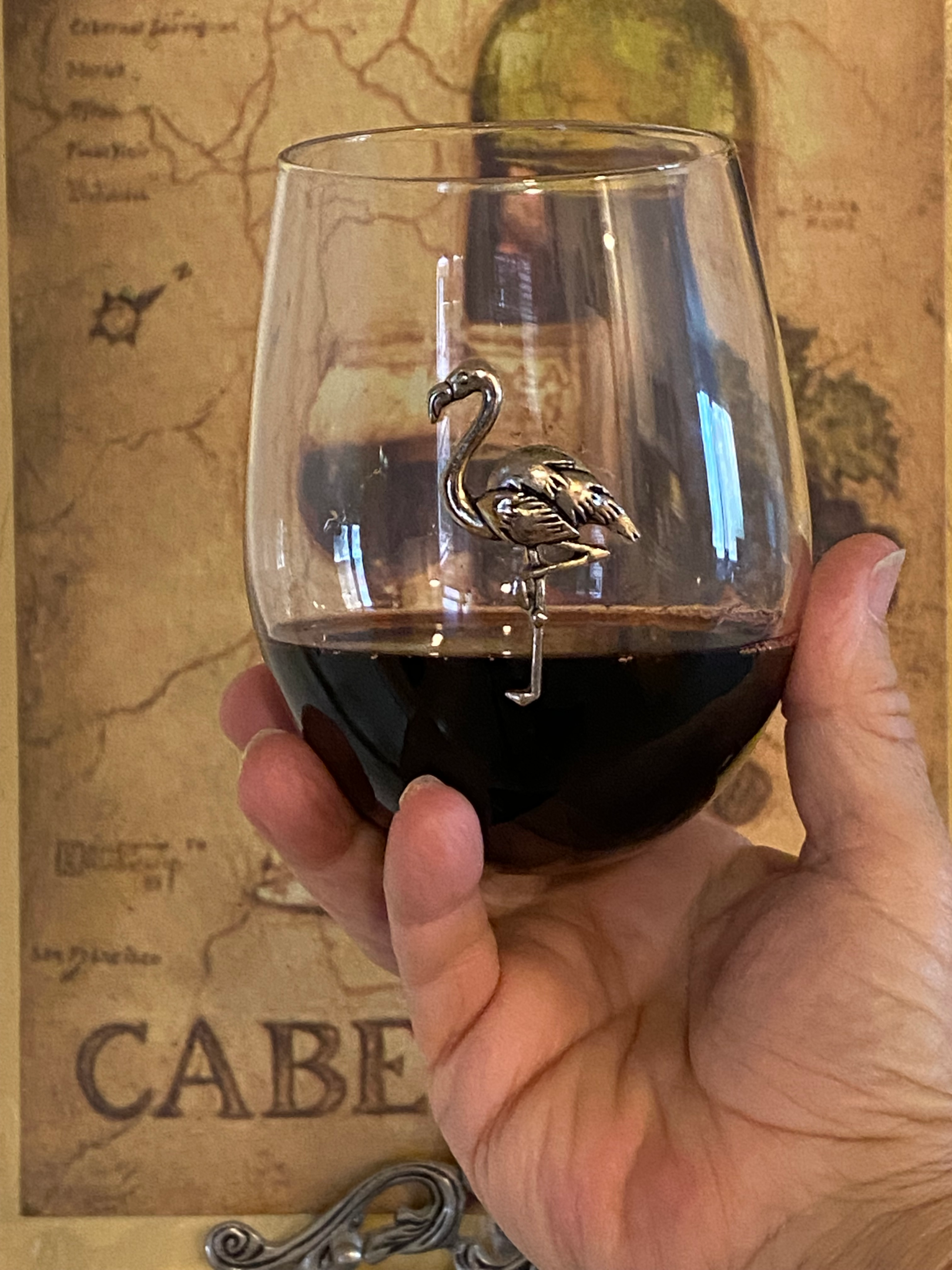 Why are wine glasses shaped like how they are? How do you hold it? Do you  hold onto the glass “stem”, or do you hold the actual glass on the palm like