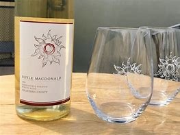 Bottle of Boyd MacDonald and a wine glass