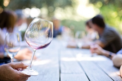 wine glass at picnic table